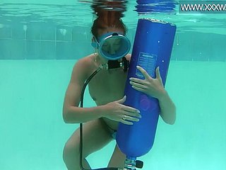 Hungarian stunner fucks a dildo underwater